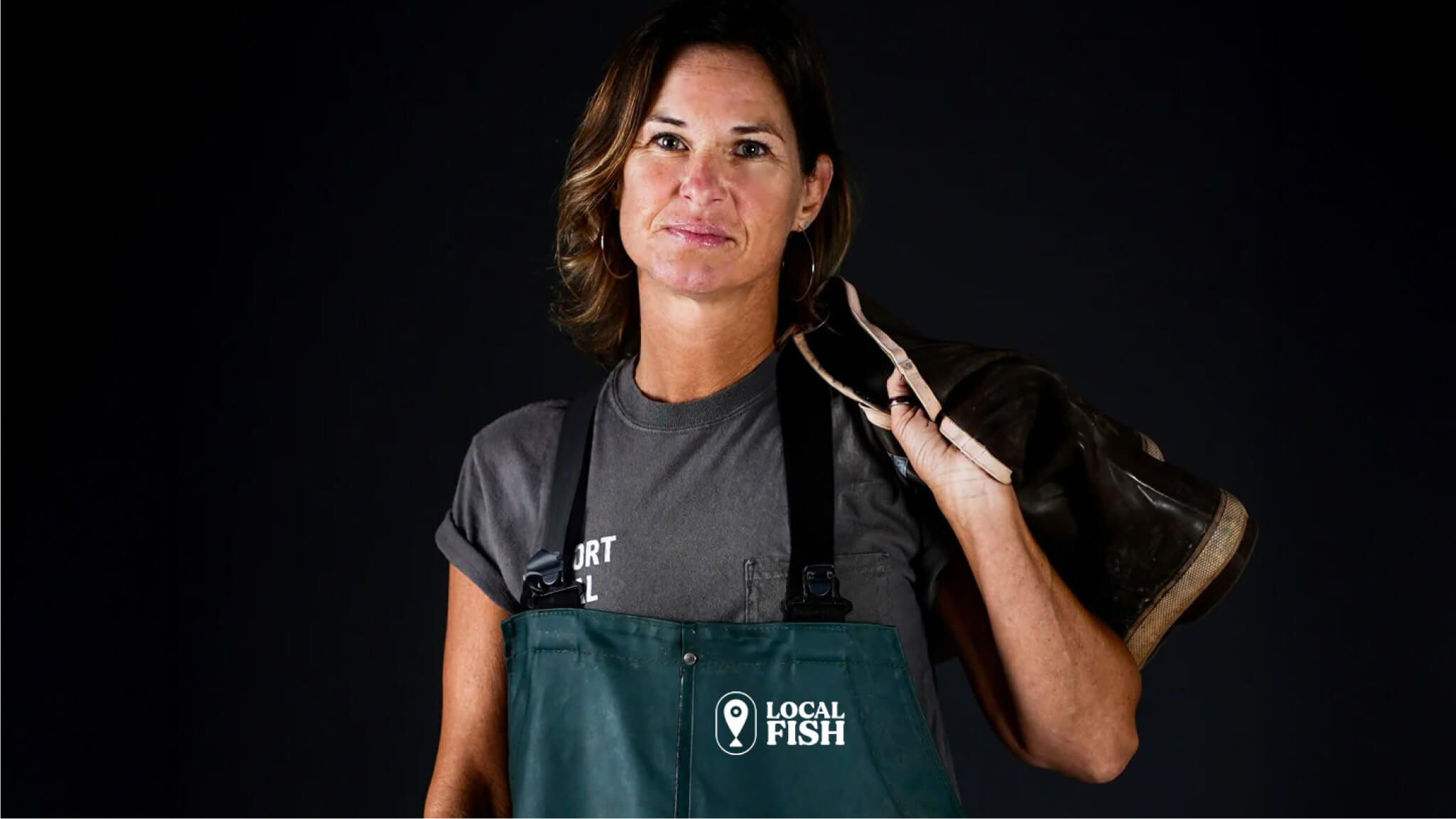 Local Fish branding by Four Fin worn by fisher woman