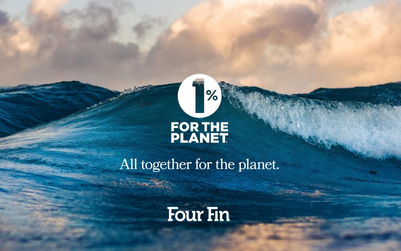 Background imagery of waves of an ocean, with the 1% for the Planet and Four Fin logos in white on the foreground